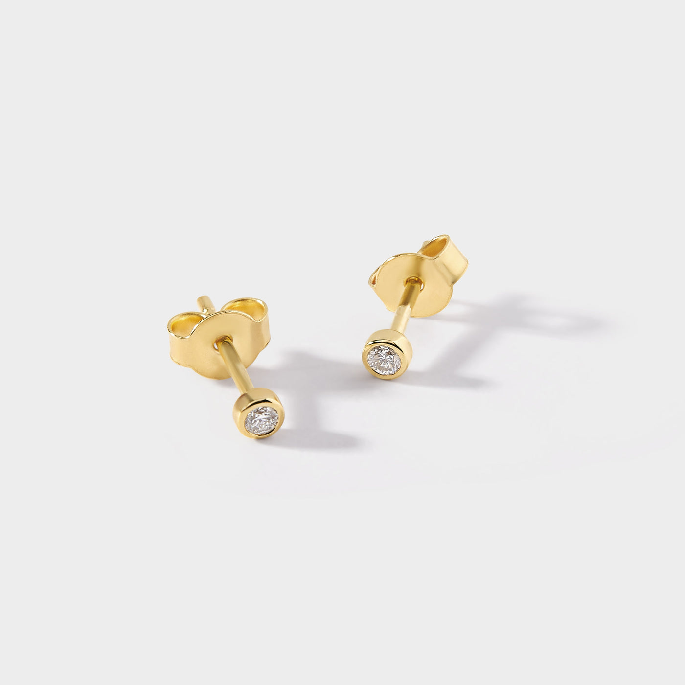 Elegant Yellow Gold Solitaire Diamond Earrings