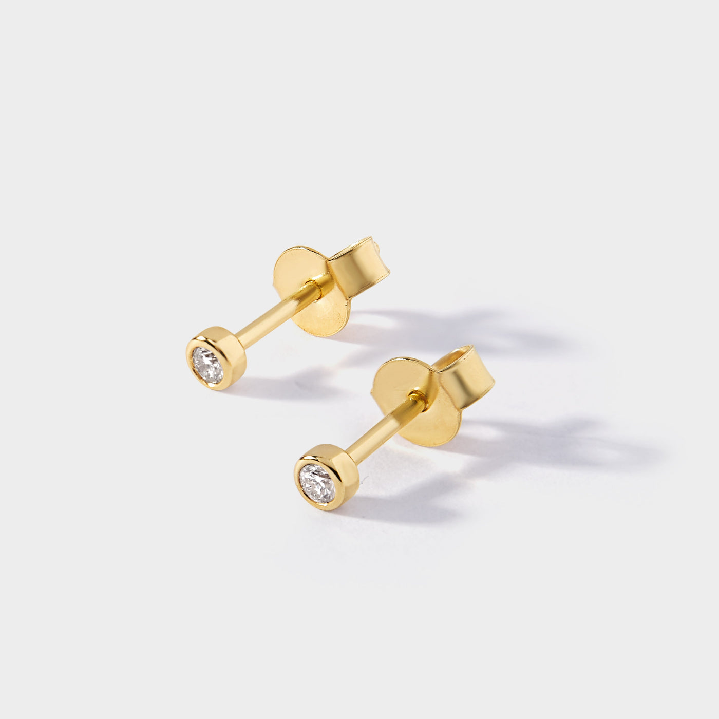 Elegant Yellow Gold Solitaire Diamond Earrings